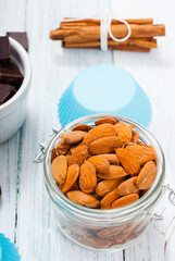 muffin baking ingredients on white wooden table
