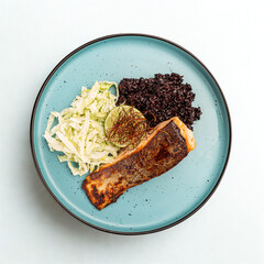 Delicious salmon fillet with black rice and fresh coleslaw