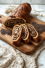 Delicious swirled chocolate nut roll cake on a wooden board