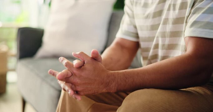 Counseling, hands and man in clinic with anxiety, overthinking and coping mechanism for nerves. Mental health, stress and male person on sofa for consultation, mistake and guilt in recovery.