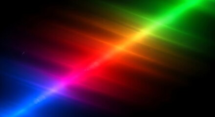 Obraz premium Abstract colorful light streaks on black background creating a vibrant and dynamic visual effect