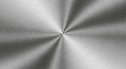 Close-up view of a brushed metal texture with a radial pattern, creating a sleek and modern background.