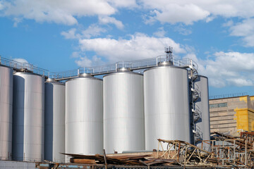 Large industrial building with many tanks and a lot of metal