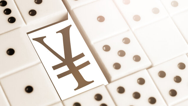 Cotai yuan symbol and dominoes.