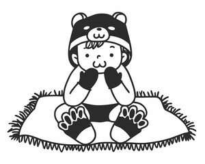 Baby wearing a bear hat