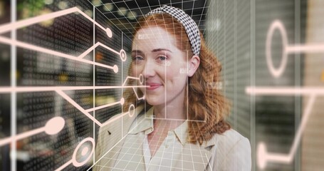 Standing red-haired woman wearing blazer and headband in office viewing 3D circuit grid and binary