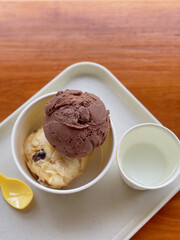 Homemade organic vanilla ice cream with mint, lemon ice cream and chocolate. Summer rest. Delicious and sweet dessert