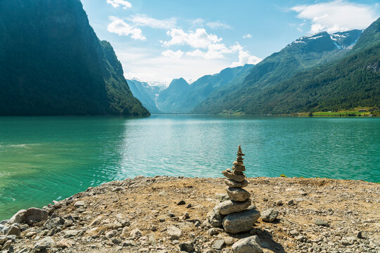 Scenic view of Oldevatnet lake and green mountains in Norway