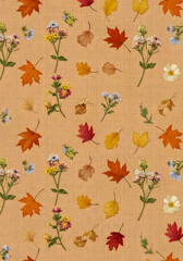 Vibrant autumn leaves and delicate wildflowers scattered across a textured burlap background, evoking a cozy harvest season feel