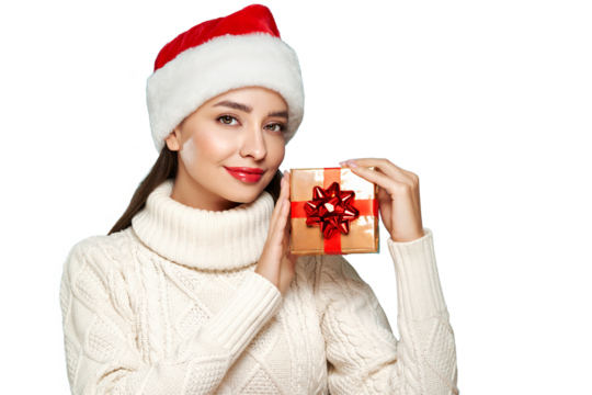 Beautiful woman in a white knitted sweater and santa hat with gift box isolated on transparent background. Christmas or New Year festivities. Holiday and Party