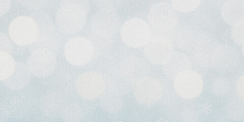 Abstract background texture with speckled patterns and subtle color variations suggesting a soft hazy atmosphere and wintery light