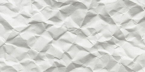 Abstract textured background showcasing a crumpled paper surface with intricate light and shadow patterns