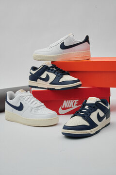2025-11-03, Minsk, Belarus, stylish nike sneakers displayed on shoeboxes. variety of designs featuring classic branding