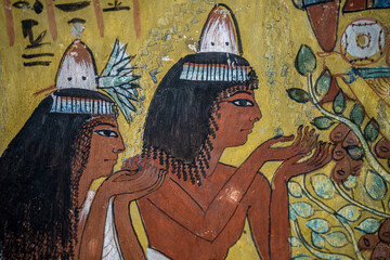 Obraz premium Ancient Egyptian Wall Painting of Couple Worshipping in the Tomb of Sennedjem
