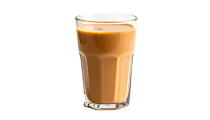 Faceted glass filled with beige liquid against a black background