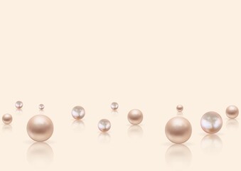 Elegant pearls scattered on a beige background with copy space at the top