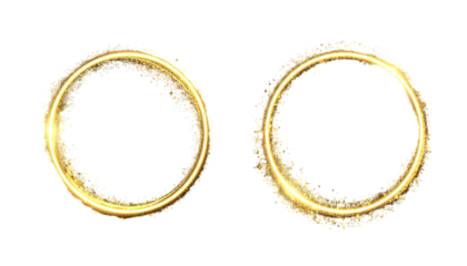 Two gold sparkling rings on black, circular, glowing effects