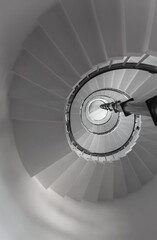 Abstract View Looking Up the Tight Geometric Spiral of a Lighthouse Staircase