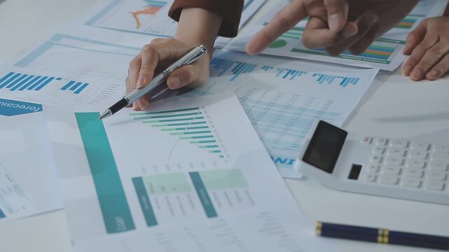 Finances Saving Economy concept. Female accountant or banker use calculator.