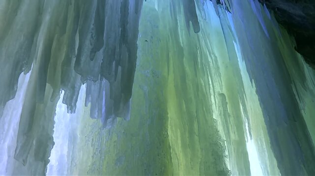 Vertical Ice Walls Inside The Eben Ice Caves In Michigan, USA. - tilt up shot