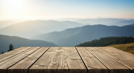 Rustic wooden tabletop overlooking serene blue mountain range at sunrise