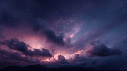 Fototapeta premium A dramatic twilight sky with colorful clouds and stars over mountain silhouettes