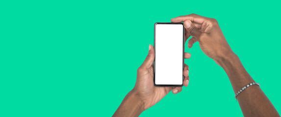 Holding smartphone with white display for digital campaign, advertising concept or promotional