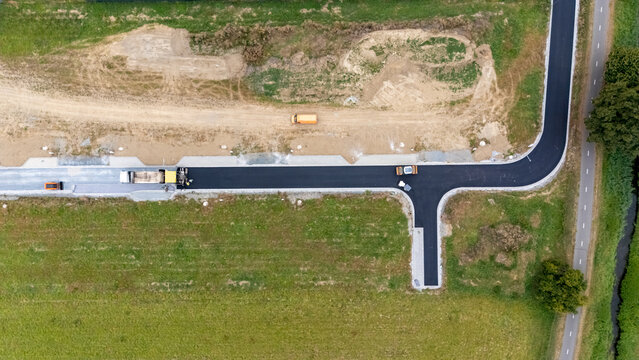 New road construction developing urban infrastructure aerial view