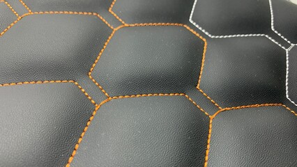 Beautiful thread stitching on the black leather.