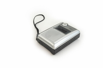 A retro cassette player placed on a table in a comfortable atmosphere.