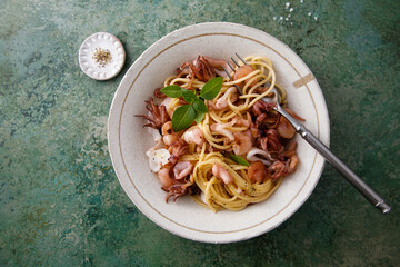 Spaghetti with seafood and basil