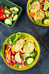 Fried cutlets in buddha bowl, fish patties.
