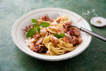 Spaghetti with seafood and basil