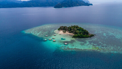 Breathtaking Aerial Island Photography with Turquoise Lagoons and Coral Reefs