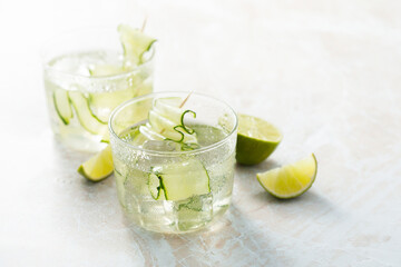 Refreshing drink with lime and cucumber	

