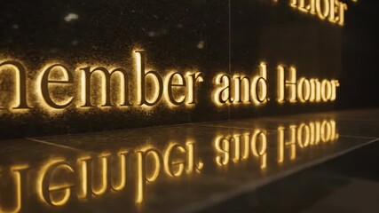 Remember and honor glowing text on a dark marble wall, reflective surface inscription for Veterans Day commemoration - Powered by Adobe
