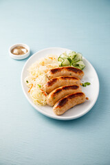 Homemade sausages with sauerkraut