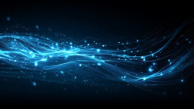 Abstract blue wave of light particles and energy.