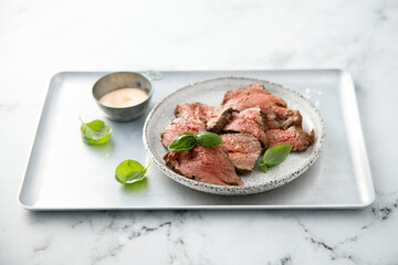 Cold roast beef with sauce