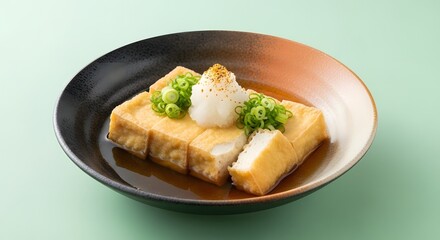 Agedashi Tofu: Crispy Fried Tofu in Dashi Broth with Grated Daikon and Scallions