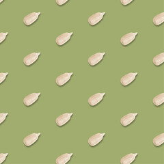 Realistic peeled sunflower seeds, seamless vector pattern on green background	