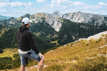 Hiker enjoying the Panorama of Ges&auml;use Mountain range and National Park