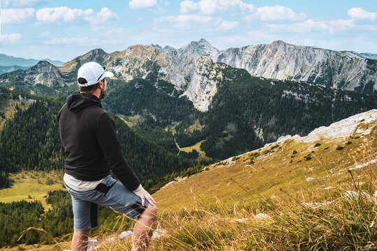 Hiker enjoying the Panorama of Ges&auml;use Mountain range and National Park