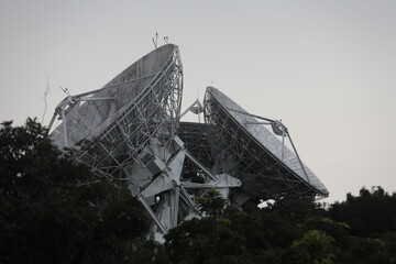Taipei, Taiwan, - June 29th 2025 - A large, aged parabolic antenna of the Chunghwa Telecom satellite ground station in Yangmingshan.
