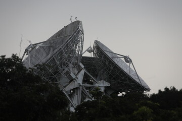 Taipei, Taiwan, - June 29th 2025 - A large, aged parabolic antenna of the Chunghwa Telecom satellite ground station in Yangmingshan.