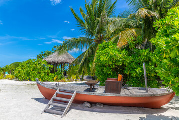 Fototapeta premium Leisure Boat Anchored Near Tropical Beach In Maldives Paradise
