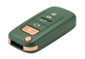 Isolated car key fob with green casing and copper trim for vehicle access, secure unlock