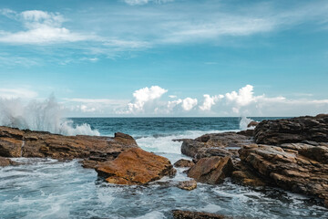 Dramatic Coastal Landscape With Ocean Waves Crashing Against Rocks