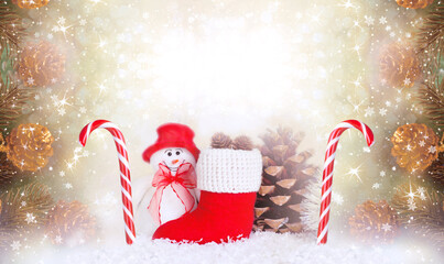 Christmas background with Snowman, Santa red boot and candy cane lollipop, branch and cones for tree decoraton. New Year winter holidays fantasy composition with decor and copy space, festive card.
