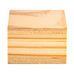Close-up of stacked, light-colored wood planks with visible grain